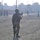 Elections: Iraqi Soldier uses a megaphone to announce instruction