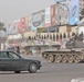 Election: A tank rumbles through the streets of central Baghdad