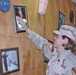Spc. Raechel Avallone dusts off a picture of Patrick Swayze