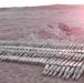 Hundreds of 57-millimeter anti-aircraft shells are laid out