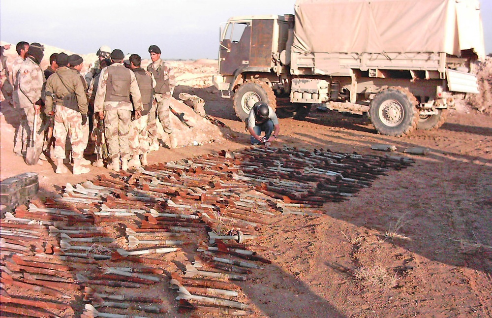 Hundreds of rockets are laid out on the ground