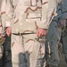 Soldiers stand in formation prior to ceremony