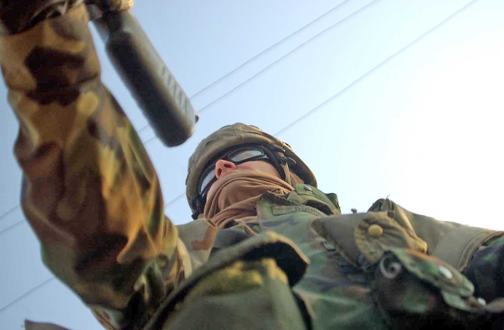 Spc. Nolan Rogers mans a machine gun in the turret