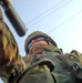 Spc. Nolan Rogers mans a machine gun in the turret