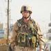 2nd Lt. Adam Young walks down the city streets