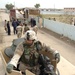Spc. Kevin Fryer provides security on top of a HMMWV
