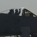 An A-10 Thunderbolt II pilot waves as he taxis for takeoff