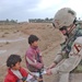 Sgt. Sidney Park distributes toothbrushes and toothpaste