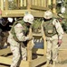 Soldiers carry the main part of playground to put in place