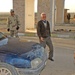 The Iraqi National Guard perform vehicle searches