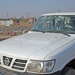 An Iraqi police vehicle damaged by shrapnel