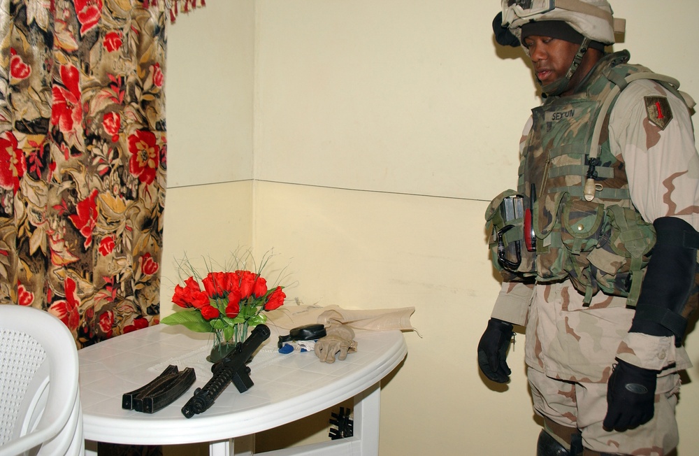 Sgt. Sexton stands by the illegal weapon he found