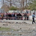 An Iraqi Police officer (right) guards a polling site