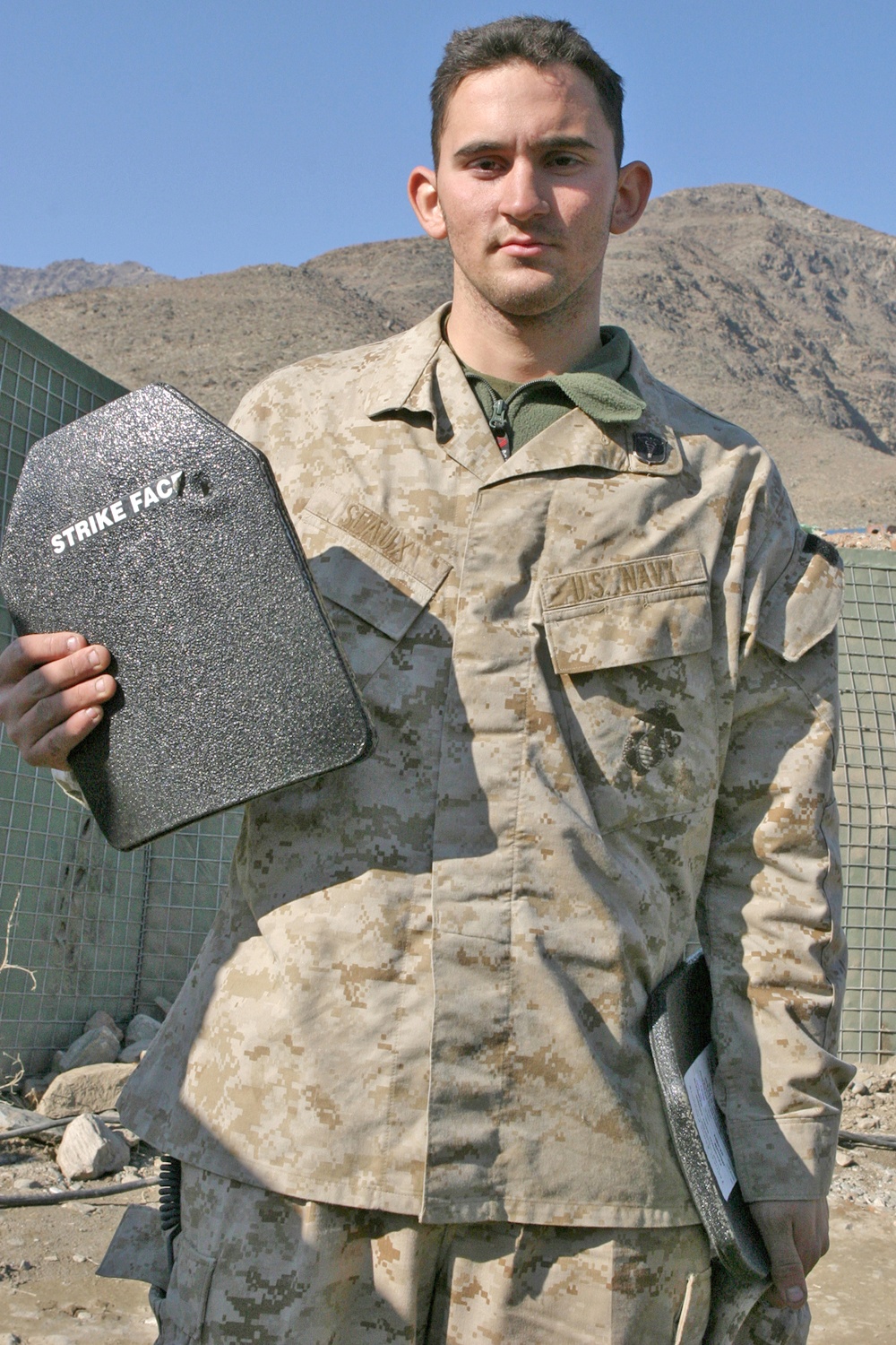 Navy Seaman Jonathon Seaux Clutches His SAPI Plate