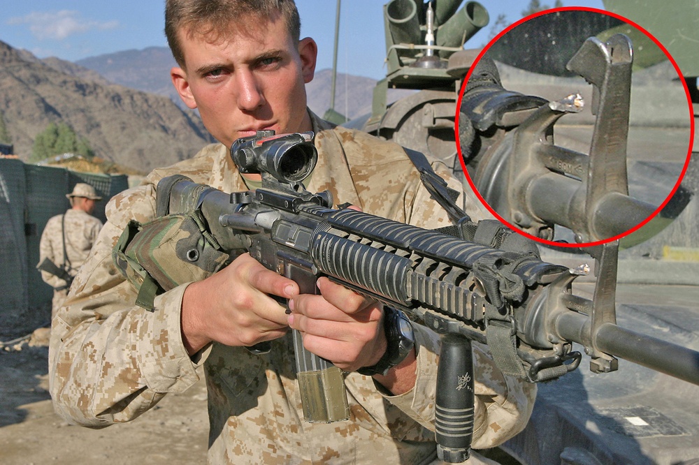Marine Sgt. Jason Burch Displays His M-16A4