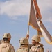 Col. Mark A. McAlister takes the Battalion colors