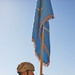 A Soldier carries the units colors
