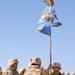 Lt. Col. Frank Hall holds his unit colors