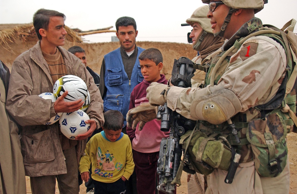 Capt. Byard chats with a local Iraqi