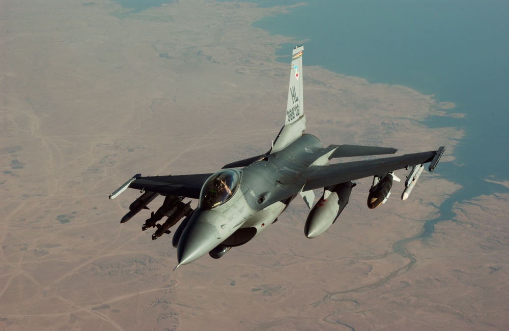 An F-16 patrols the Iraqi desert during a mission
