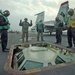 Sailors raise the Shooter Bubble on the flight deck