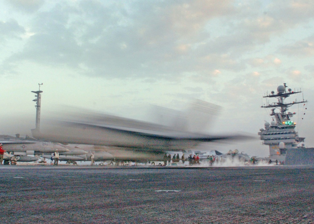 An F/A-18 Hornet launches from one of four catapults