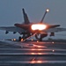 An F/A-18 Hornet makes an arrested landing