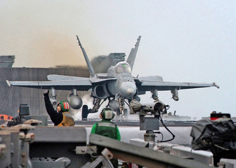 An F/A-18C launches from one of four catapults