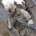 Capt. Henry Delacruz tries to dig up a mortar round