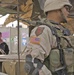 Capt. Delacruz speaks with Iraqi policeman about security