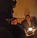 Capt. Henry Delacruz speaks with Iraqi polling workers
