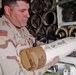 Sgt. Cory Brandt prepares a charge to be loaded
