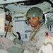 SSgt. Michael LaCoste confirms the setting on a round prior
