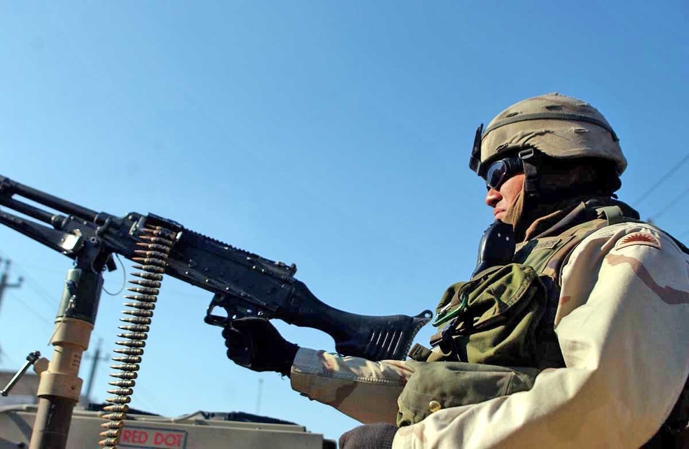 Spc. Raymond Magallanes stands in a turret