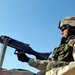 Spc. Raymond Magallanes stands in a turret