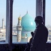 Staff Sgt. Aaron Cochron stands watch from a building