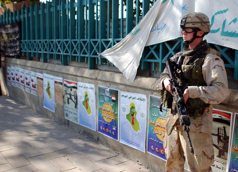 Political posters line the walls of downtown Baghdad