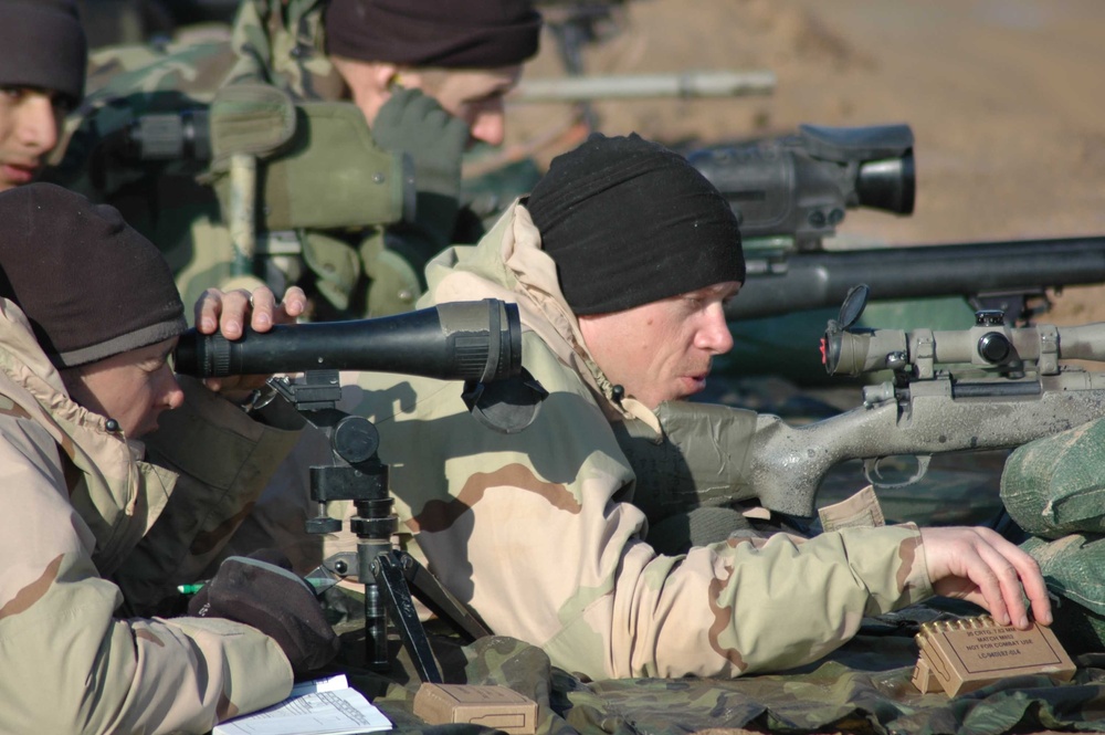 Sgt. Widner reaches for ammunition to reload his weapon