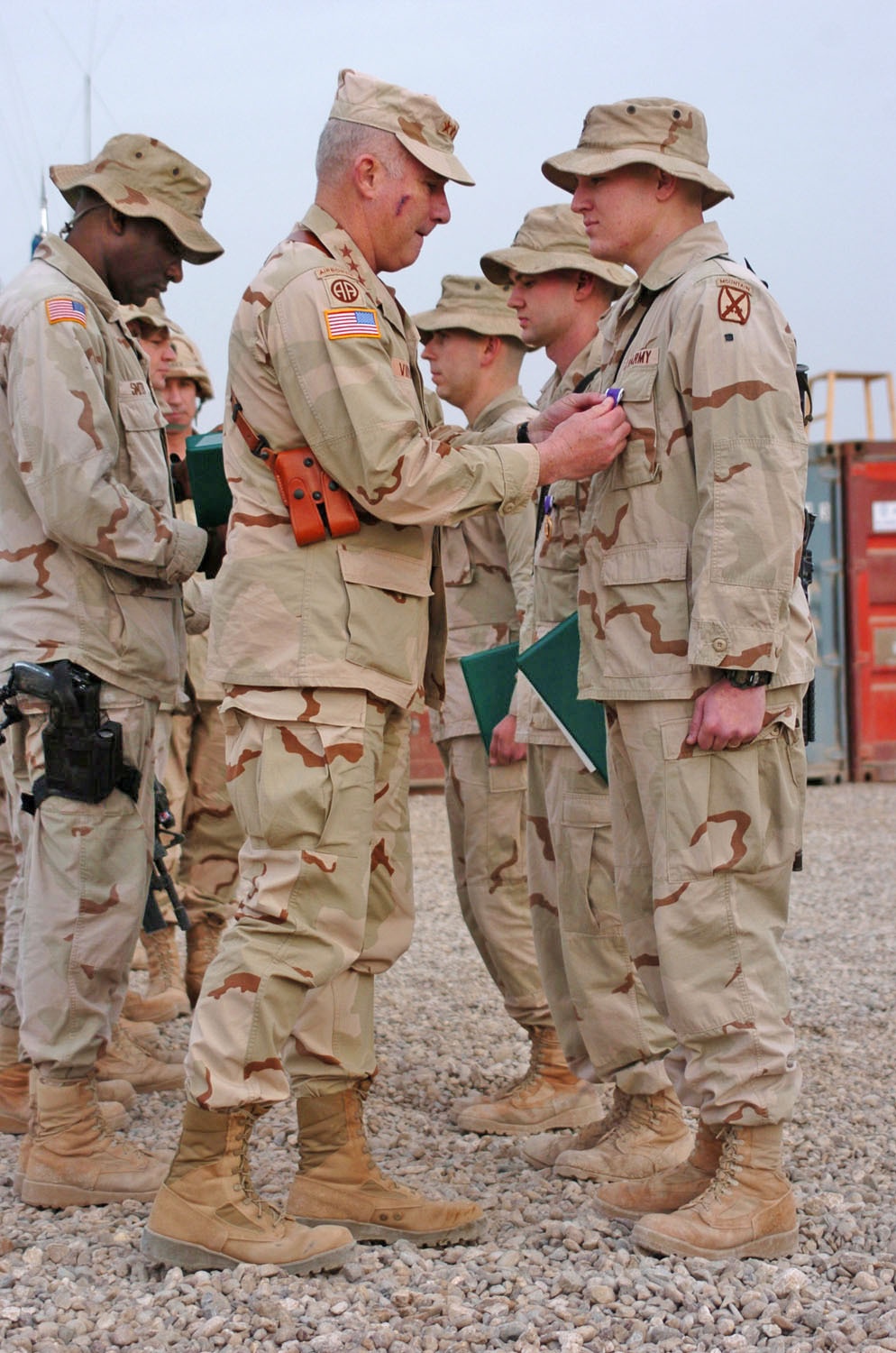 Lt. Gen. Vines Presents Pfc. Bild With a Purple Heart