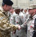 British Maj. Gen. Gilchrist Congratulates Maj. Miiller