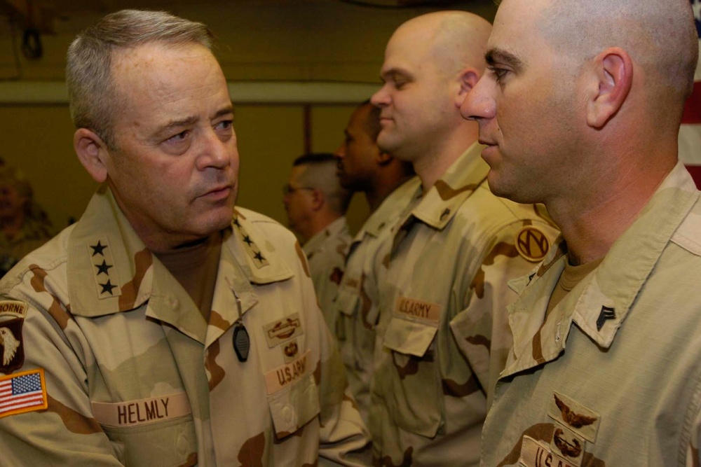 Shaking hands with each of 26 U.S. Army Reserve Soldiers