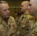 Shaking hands with each of 26 U.S. Army Reserve Soldiers