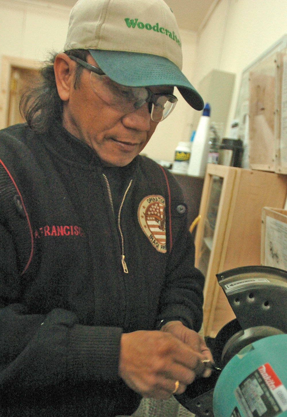 Alfredo Francisco puts the finishing touches on a key