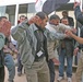 Iraqi citizens celebrate by dancing and chanting