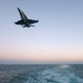 An F/A-18C Hornet approaches the landing area