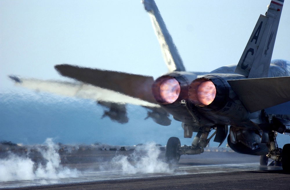 An F/A-18A+ Hornet launches off one of the catapults