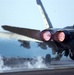 An F/A-18A+ Hornet launches off one of the catapults