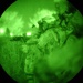 Staff Sgt. Davis adjusts his night vision goggles