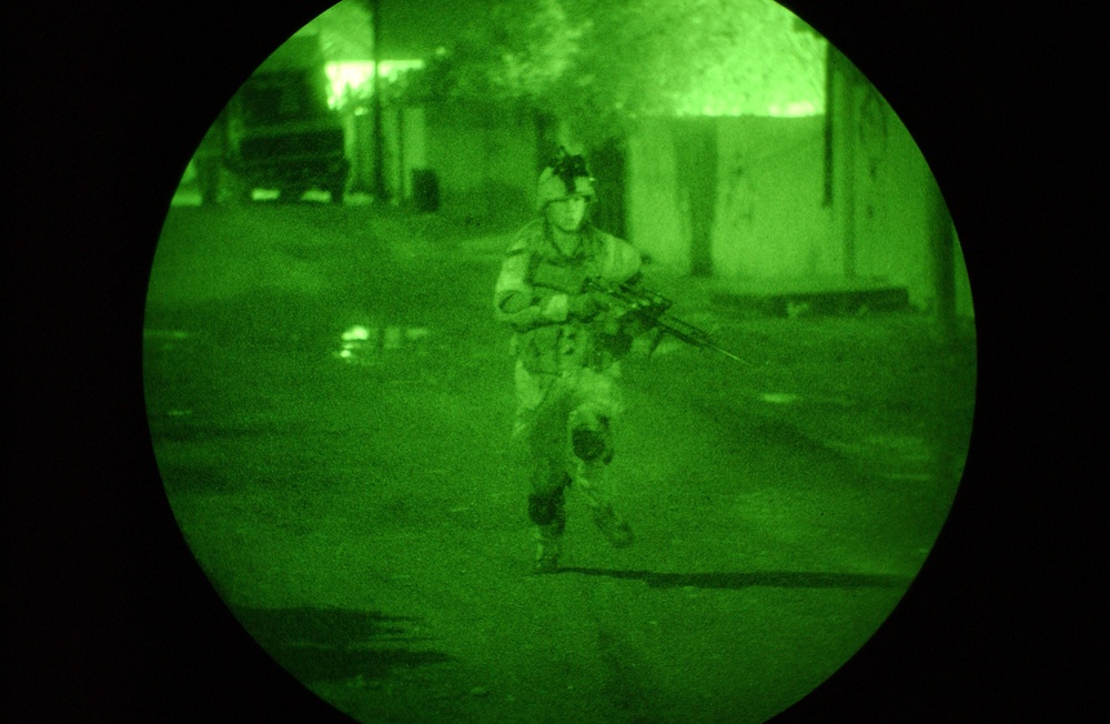 Sgt. Meyer moves to stop a car that is out past curfew
