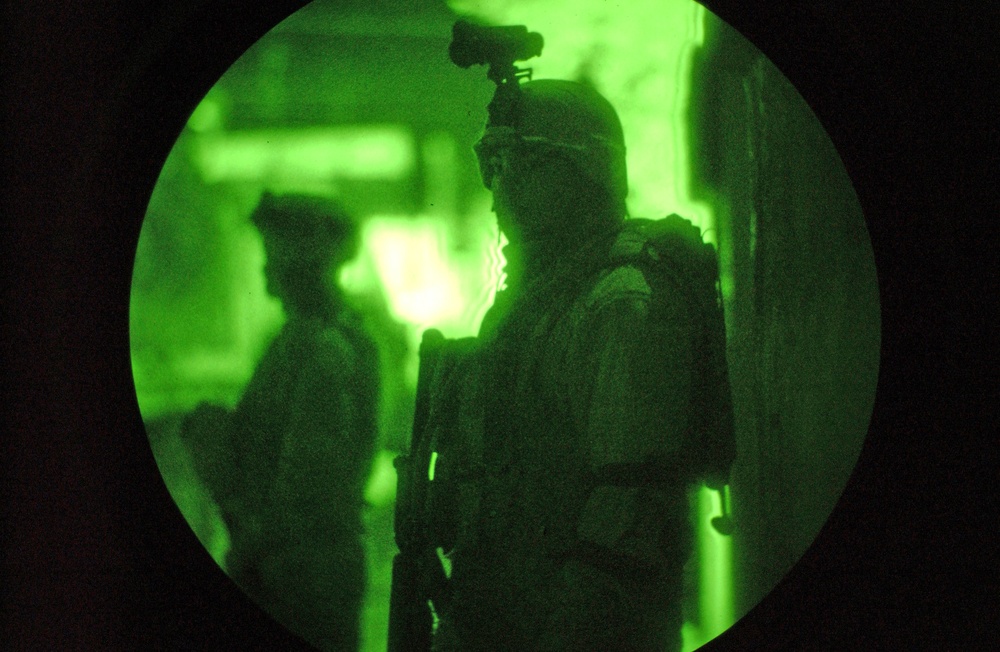 Spc. Harris keeps watch for any suspicious activity
